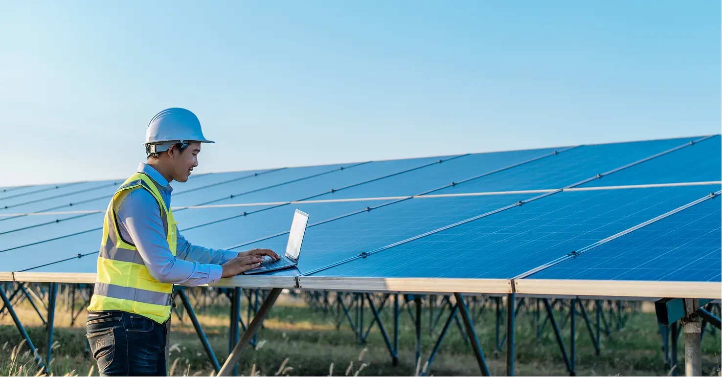 Engineer assessing a rooftop during a solar consultation and feasibility study in Malaysia
