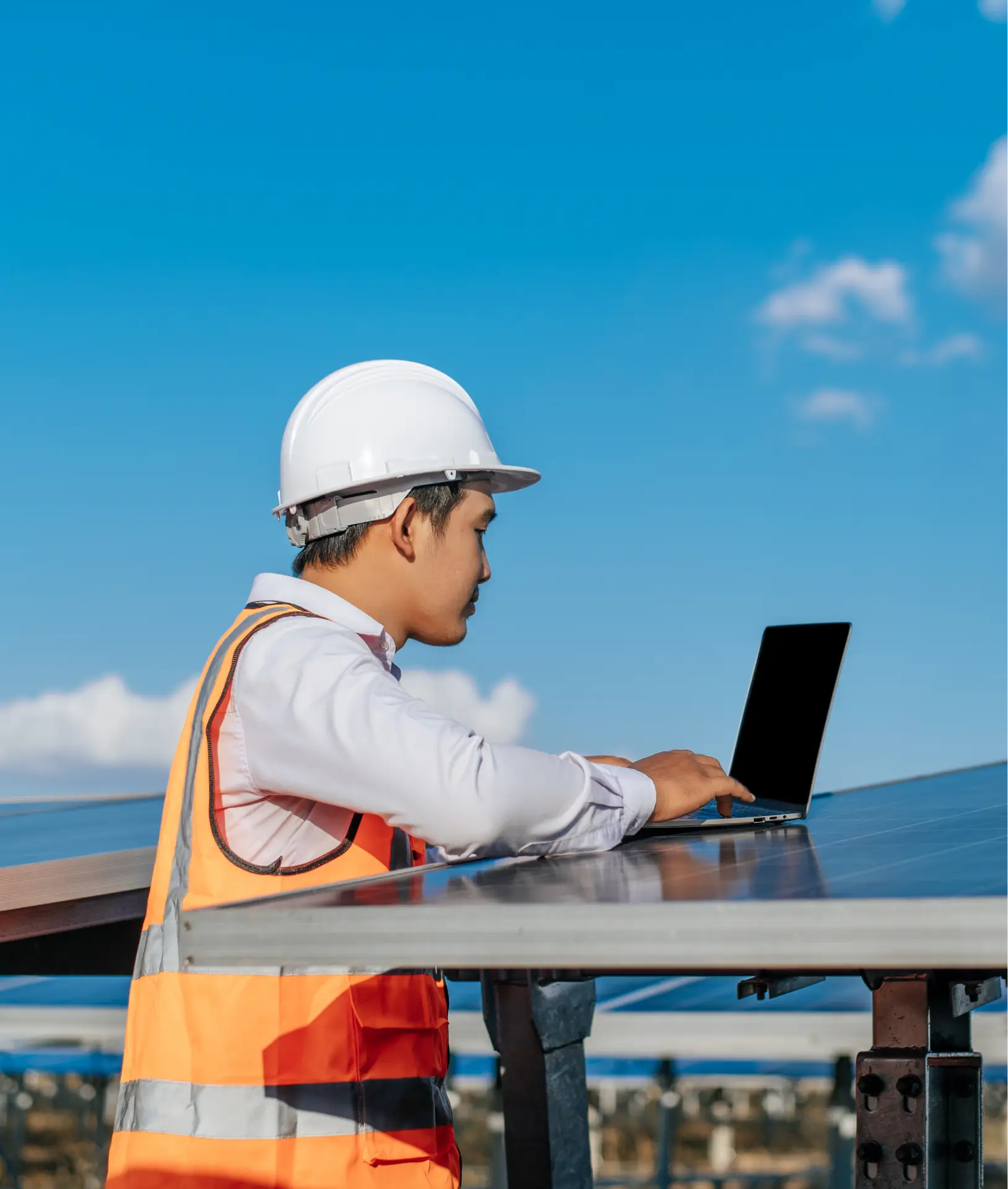 Technician monitoring solar system performance for after-sales support